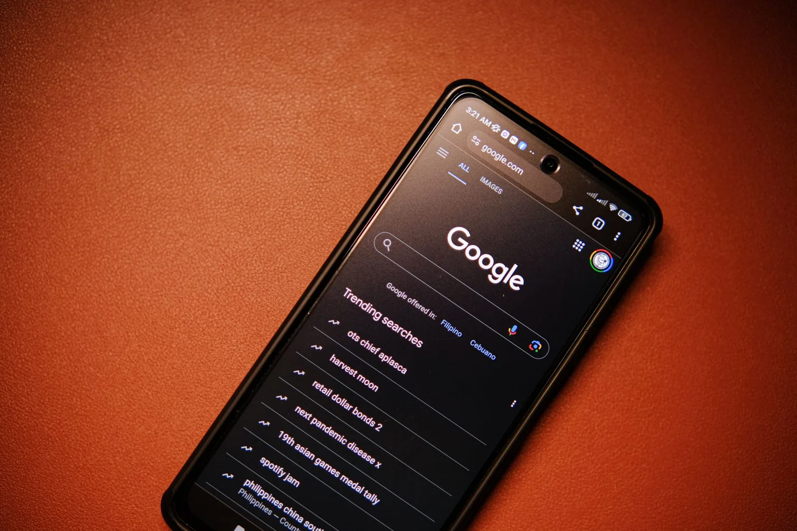 A phone showing a page of Google search results, the surface AI search optimization works alongside.