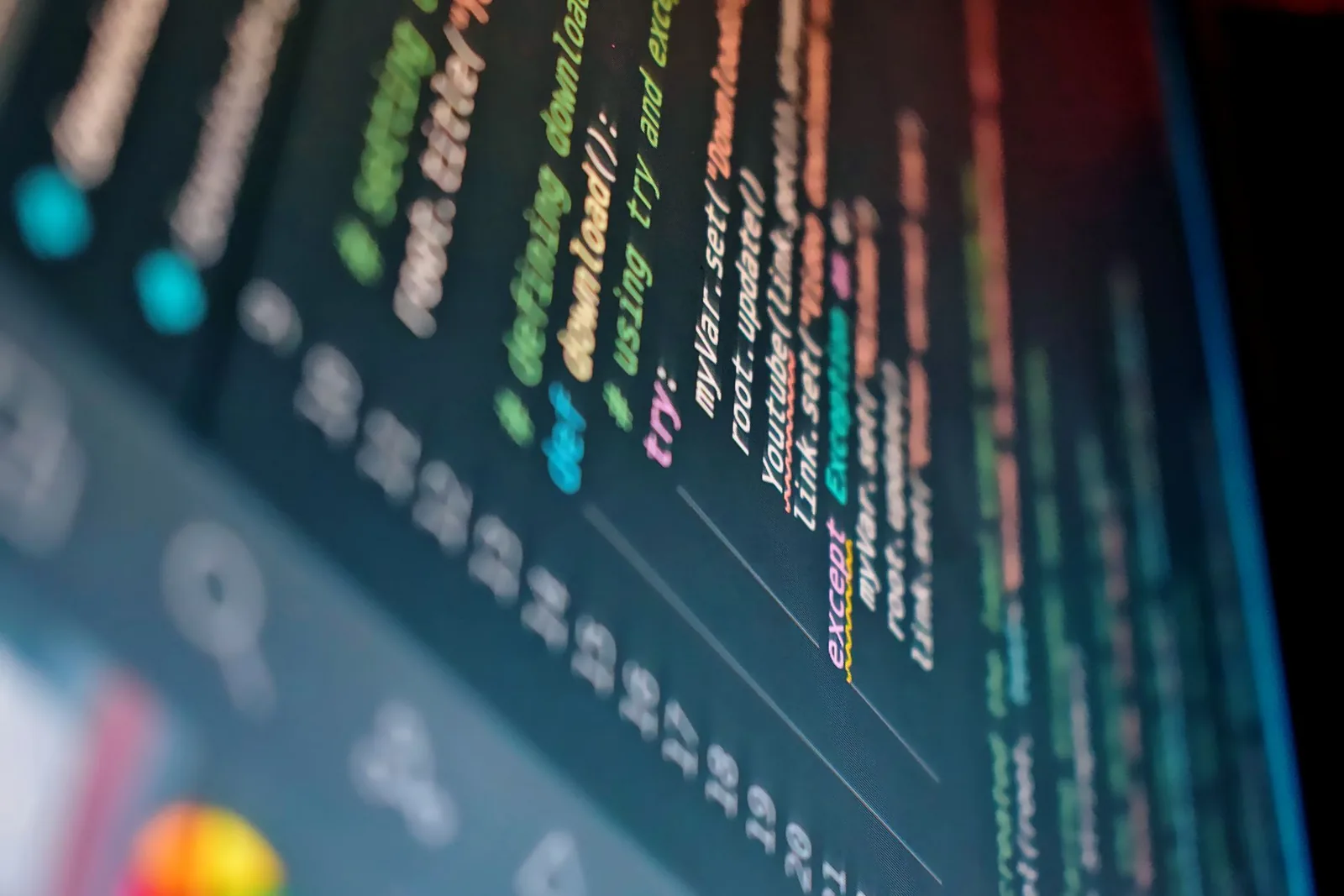Lines of code on a monitor seen close up, the kind of plain-text file that llms.txt is.